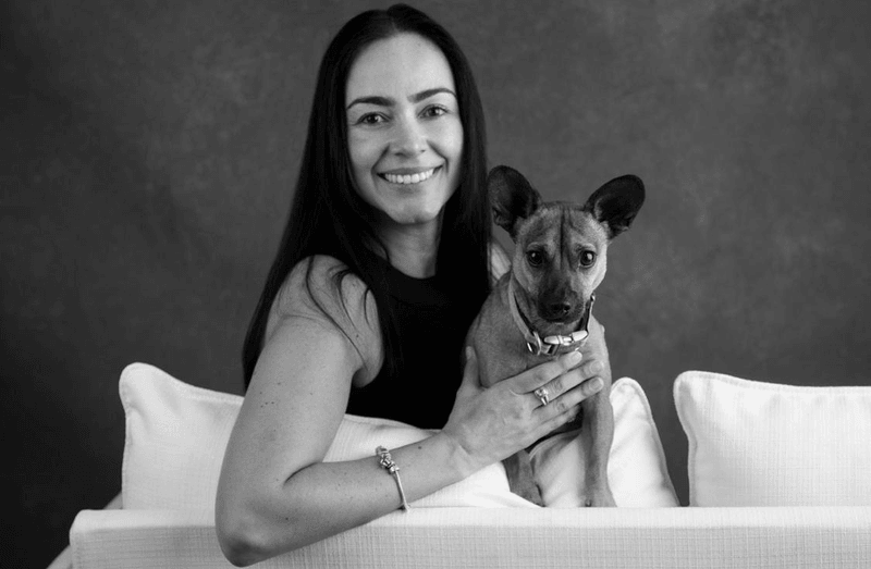 Photograph of Elizabeth Casas with her dog